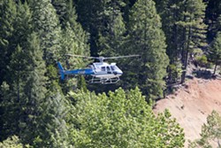 PHOTO BY PRESTON DRAKE HILLYARD - A CHP helicopter searches for Sophia.