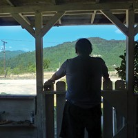 Arthur Jones stands on the front porch of his home, where law enforcement found methamphetamine and cash after he was arrested in late 2011.