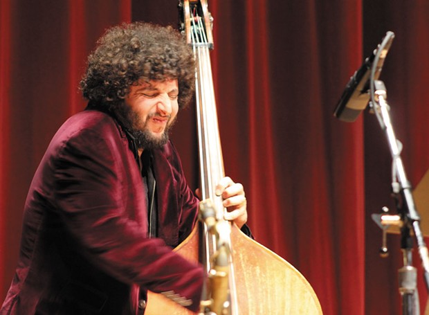 Bassist Omer Avital takes a solo while leading a vibrant quintet presented in concert by the Redwood Jazz Alliance in HSU's Fulkerson Hall on feb. 25. - PHOTO BY BOB DORAN