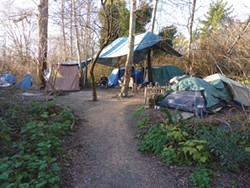 PHOTO BY RYAN BURNS - “Camp Happy,” home to Dave, Steve, Robert and anyone who cares to join them.