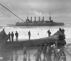 U.S. NAVAL HISTORICAL CENTER - Crewmen being brought ashore two at a time by breeches buoy from the stranded USS Milwaukee - January 1917