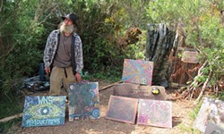 PHOTO BY LINDA STANSBERRY - Dawson "Roadie" Phillip stands in front of his home and studio.
