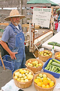 Denis Potter at the Farmers' Market. Photo by Bob Doran.