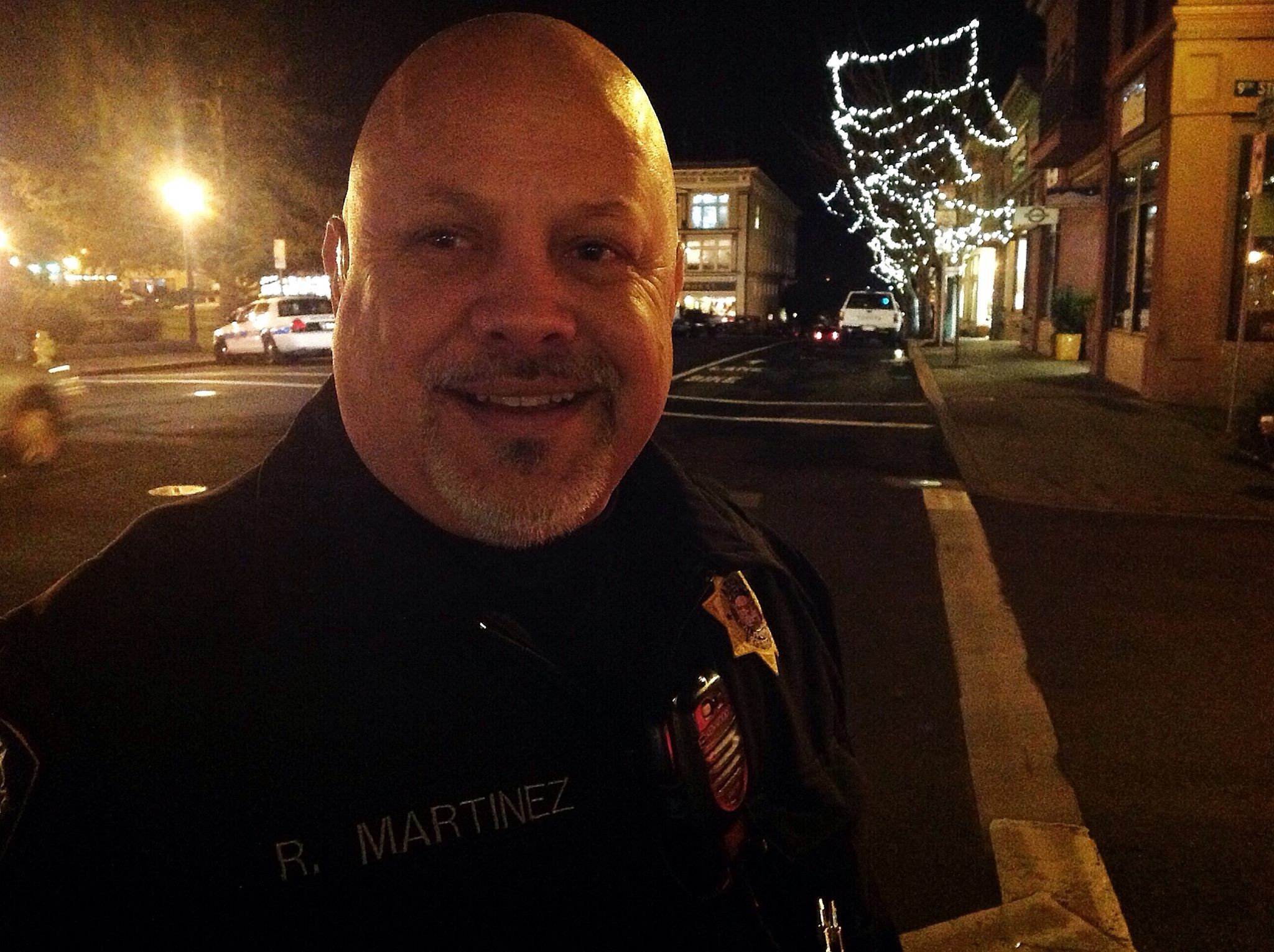 Detective (and Dr. Squid drummer) Bob Martinez patrols the Arcata Plaza and vicinity Friday night, mostly giving warnings to cigarette smokers. - PHOTO BY BOB DORAN