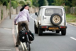 PHOTO COURTESY OF UNIVERSITY OF BATH - Drivers gave U.K. cycling researcher Ian Walker extra clearance when he wore a wig.
