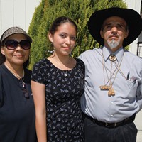 Gayle Norris, left; her daughter Jamyelynn, 19, a traditional dancer; and Yurok Tribe Chairman Thomas O'Rourke Sr. at the ceremony to welcome back ceremonial items.