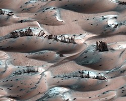 NASA PHOTO - HiRISE 2009 image taken near the Martian North Pole. The dark streaks are landslides of basalt sand overlying dunes covered with white frozen carbon dioxide (dry ice).