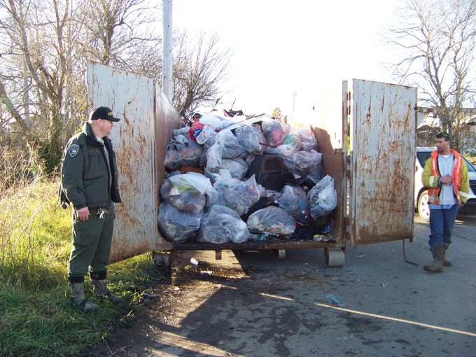Humboldt County Sheriff’s Senior Correctional Officer Trent Hauger and his inmate crew loaded up two of these 40-yard dumpsters last Friday with junk from one man’s camp. - PHOTO BY HEIDI WALTERS