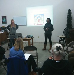 PHOTO BY JACOB SHAFER - Instructors Alexis Wilson Briggs (left) and Kyndra Miller lead a class about feminism and cannabis.