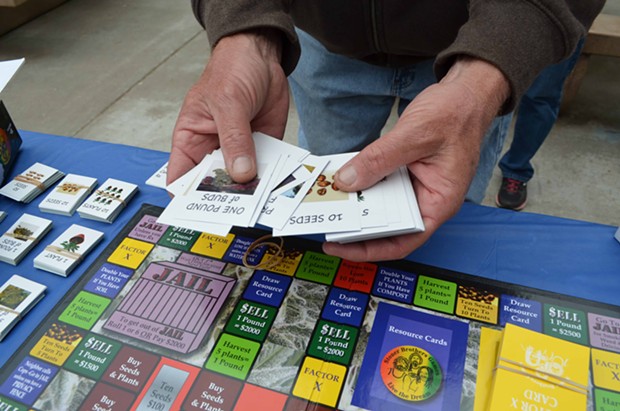 Jim Gray, of McKinleyville, promoted his homemade board game at the event. "Weed: The Game" is a lot like Monopoly. Grab resource cards, race to the finish line (dispensary), and "the winner has the most money." - GRANT SCOTT-GOFORTH