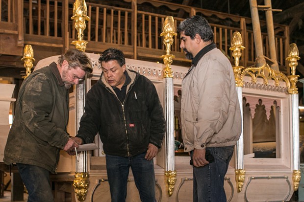 L-R: Eric Hollenbeck with Blue Ox master woodworkers Enrique Ayala and  Cesar Murillo . - PHOTO BY ALEXANDER WOODARD
