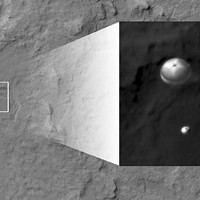 My favorite image from Curiosity's landing, taken from over 200 miles away by NASA's Mars Reconnaissance Orbiter, shows Curiosity a minute before landing, dangling beneath its 51-foot diameter parachute about two miles above Gale Crater.