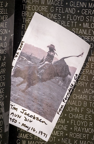 This photo of Tim Jacobsen, of Ferndale, who was killed in Vietnam at age 21, was placed on the replica memorial Wall. - MARK LARSON