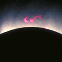One of two solar prominences visible during the 1991 eclipse, about ten earth-diameters high. The overexposed photo shows the delicate structure of the sun’s hot white corona.