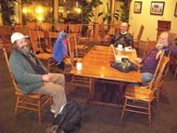 PHOTO BY HEIDI WALTERS - Poets on the Plaza stalwarts: Joshua “Haiku” (left), Robert Vaughn (center) and Carl Miller.