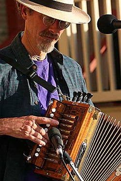 Randle Lundberg plays button accordion with The Bayou Swamis at last year's Humboldt Folklife Festival.  Photo by Bob Doran