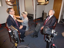 PHOTO BY RYAN BURNS - Rep. Jared Huffman (left) gets primped for his interview with Dan Rather.