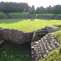 Roman military amphitheater at the legionary fortress of Caerleon, on the River Usk near Newport, south Wales. Arthurian legend links the site with Camelot.