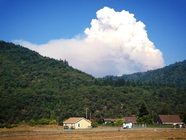 Smoke rises over the Hoopa Valley Tribal Reservation. - KEN MALCOMSON