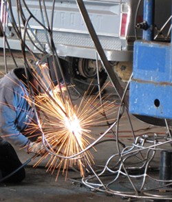 PHOTO BY JASON MARAK - Sparks fly - Jack Sewell at work