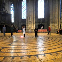 The 861-feet long, 11-circuit labyrinth in Chartres Cathedral was completed around the year 1220.