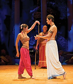 The courtesan Vasantasena (Miriam A. Laube) gives her jewels to Charudatta (Cristofer Jean) as Maitreya the Brahmin (Michael J. Hume) looks on, in the Oregon Shakespeare Company production of The Clay Cart. Photo by David Cooper.
