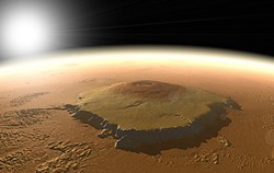 PHOTO FROM NASA - Three times as high as Mount Everest, Mars' Olympus Mons could plausibly have sheltered microscopic life under its warm flanks for billions of years.
