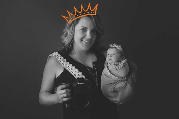 Kelsey Marchi, owner of Kelsey Marchi Newborn Photography, voted Best Photographer, with newborn Reegan Waters.