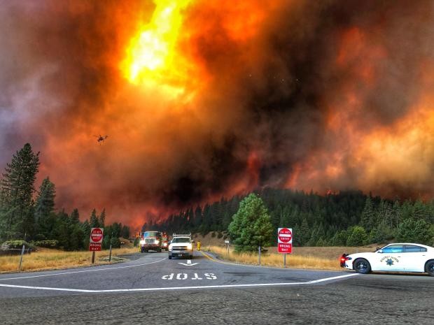 Flames from the Delta Fire near an Interstate 5 exit on Saturday. - INTERAGENCY FIRE MANAGEMENT TEAM