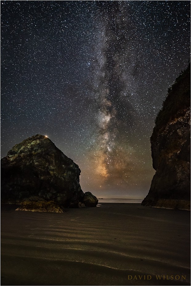 Near the cave’s entrance, Mars peeks over the edge as two rocks frame the Milky Way. - DAVID WILSON