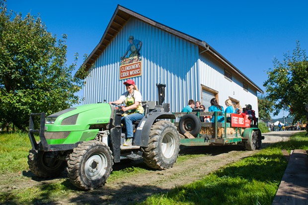 A tractor-pulled hayride through Clendenen's apple orchard. - PHOTO BY MARK MCKENNA