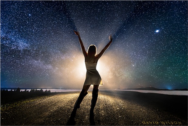 By mid-May, catching the Milky Way’s core is no longer an early morning activity. Its position above the horizon a little after 10 p.m.is similar to where it was in February at 5 a.m. This photograph is from somewhere on Monument Road outside of Rio Dell with model Morgan Crowl, May 14, 2018. - DAVID WILSON