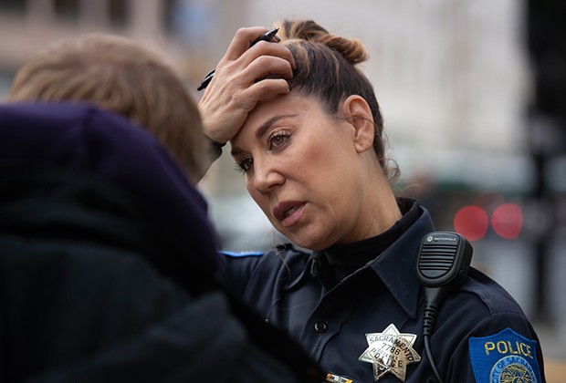 Michelle Lazark, a Sacramento police officer who works in the Mental Health Unit, put Jeffrey Jurgens back in touch with his mother. - PHOTO BY RANDY PENCH FOR CALMATTERS