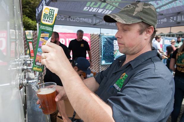 Local beer was on tap at the Oyster Fest alternative Shuck Yeah. - PHOTO BY MARK MCKENNA