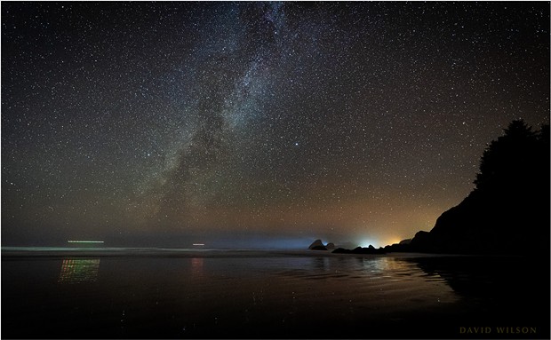 Reflections at Moonstone Beach. While we waited for meteors, a pair of helicopters skimmed the horizon as blinking dots sliding toward Trinidad’s glow. The rest of the galaxy hanging overhead didn’t notice us. Humboldt County, California., November 21, 2019. - DAVID WILSON