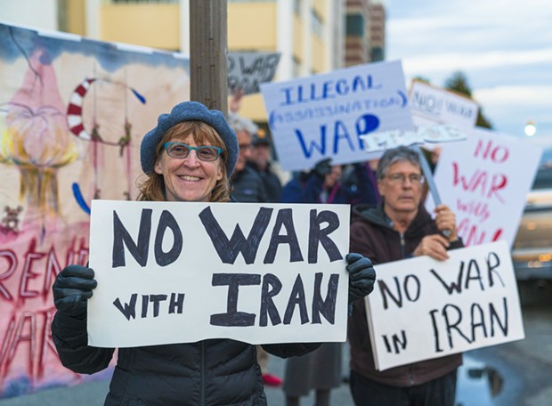 Protesters warn against war with Iran. - PHOTO BY ZACH LATHOURIS