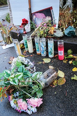 A memorial left near the Spear Avenue home where Josiah Lawson was killed. - FILE