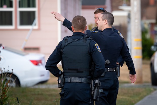 Eureka Police officers at the scene of a July 23 standoff with a reportedly suicidal man. - MARK MCKENNA