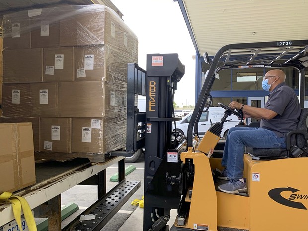 A delivery of state-supplied masks, face shields, no-touch thermometers, and hand sanitizer arrive for when Kern County schools are able to open for in-person instruction. - KERN COUNTY OFFICE OF EDUCATION