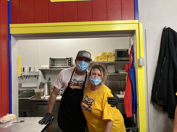Todd and Carrie Nuse, owners of Chicago Dog House. - PHOTO BY JENNIFER FUMIKO CAHILL