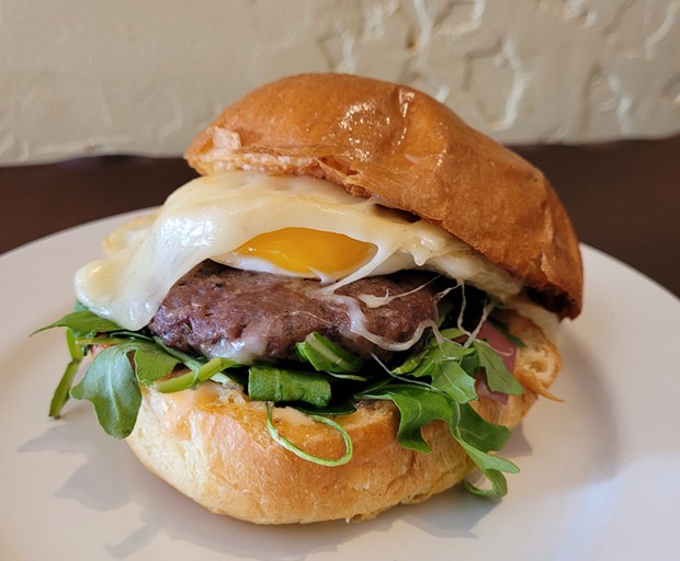 An OAB burger topped with a fried egg. - SUBMITTED