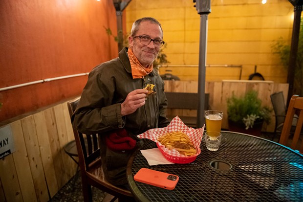 Enjoying Brabant fries and a grilled cheese under the Shanty's patio heat lamp. - PHOTO BY MARK MCKENNA