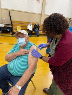 Dale Stocky celebrates his 75th birthday by getting the COVID-19 vaccination he'd newly become eligible for at a Mad River Community Hospital vaccine clinic Jan. 23 at Pacific Union Elementary School. - FILE