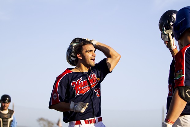 Crabs first baseman Tyler Ganus (#34) celebrates with teammates at home plate after hitting the second of three home runs out onto the freeway for the Crabs in the second inning against the Seattle Studs on June 17, 2021. - THOMAS LAL