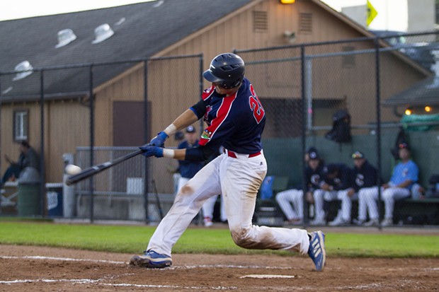 Crabs catcher Andrew Allanson (#22) makes contact with a pitch while facing the Seattle Studs on June 17, 2021 at Arcata Ballpark. Allanson finished the night with three hits, three runs and one RBI. - THOMAS LAL