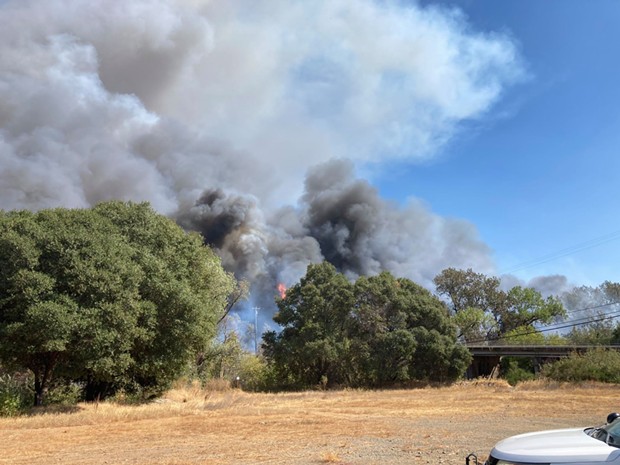 A Sept. 12 picture of the Hopkins Fire looking east in the area of Moore Street and Eastside Calpella Road in Calpella. - MENDOCINO COUNTY SHERIFF'S OFFICE