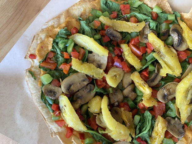 The veggie flatbread, essentially a salad that knows how to have a good time. - PHOTO BY JENNIFER FUMIKO CAHILL