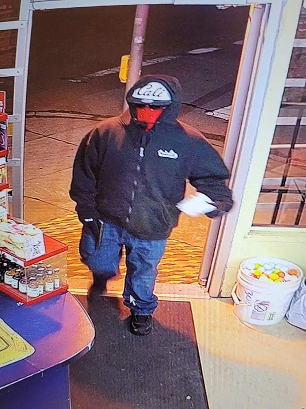Surveillance photo of the armed suspect. - SUBMITTED