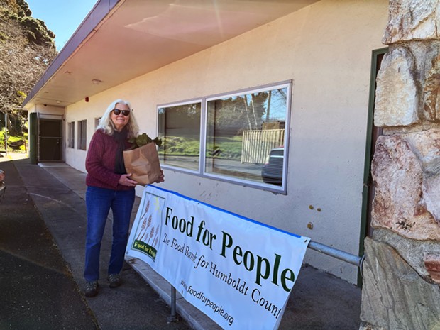 Food for People Executive Director Anne Holcomb in front of the nonprofit's new temporary Eureka pantry. - SUBMITTED