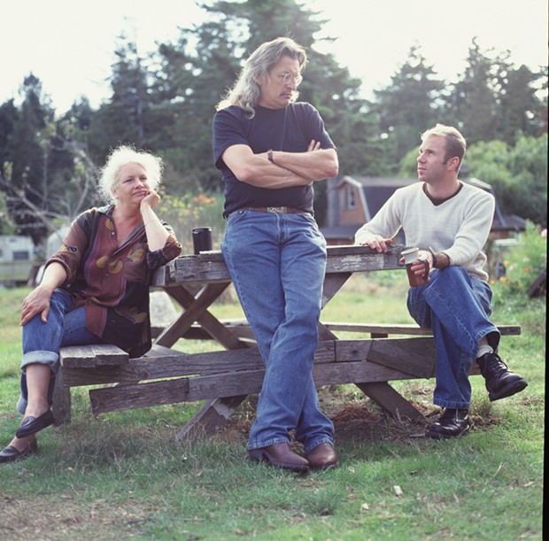 Rick Bartow, center, with wife Julie Swan and gallerist Charles Froelick, 1996. - COURTESY OF CHARLES FROELICK